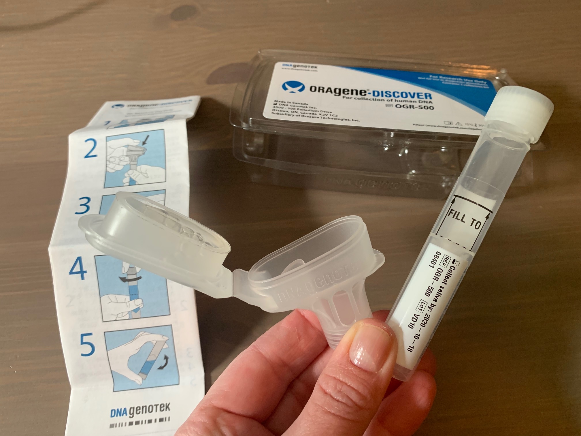 Instructions, tube, and packaging for a "spit kit" for DNA genetic testing
